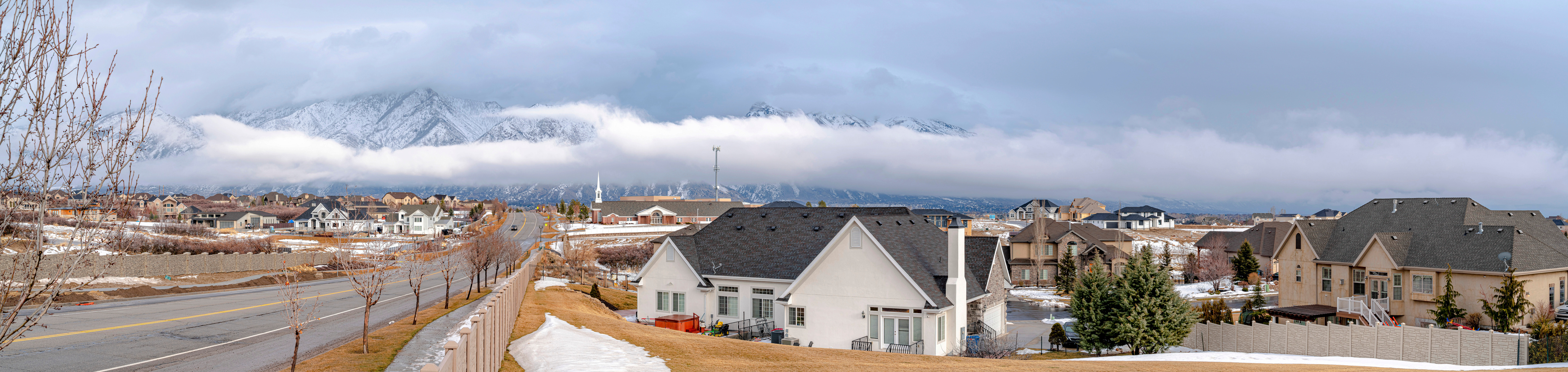 Fenced residential area near the road at Draper, Utah